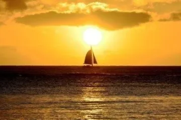 a sunset over a body of water