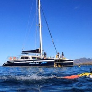 a small boat in a large body of water