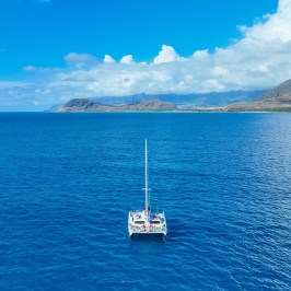 a small boat in a large body of water