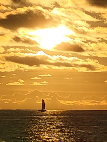 a sunset over a body of water