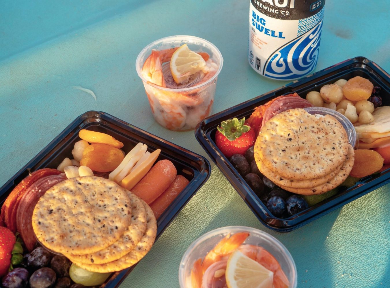 a box filled with different types of food on a table